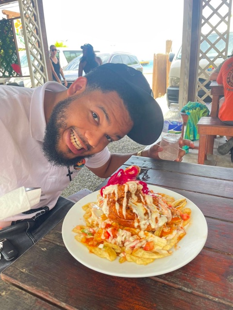 A heaping plate of island cooking at the beachside lunch stop
