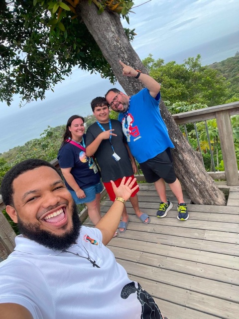 Lookout selfie above the treetops and the sea